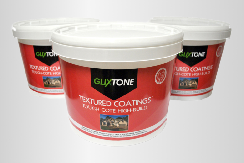 Plastic tubs of Glixtone Tough-Cote textured masonry coating on a pale grey background.
